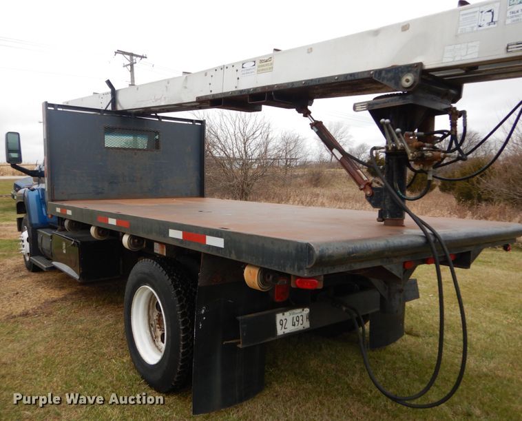 image for item DH5044 2003 GMC C7500 flat dump bed truck with conveyor