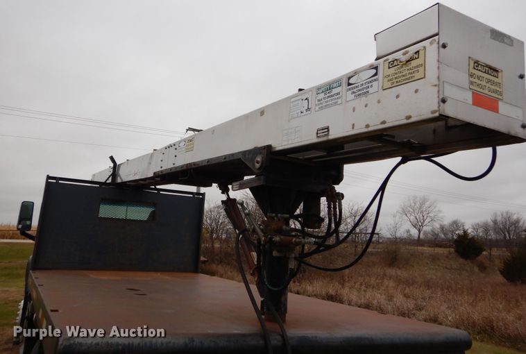 image for item DH5044 2003 GMC C7500 flat dump bed truck with conveyor