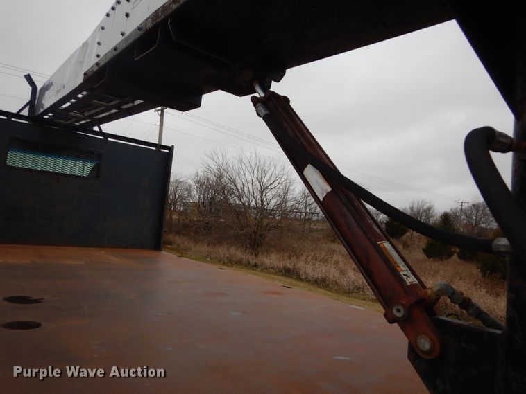 image for item DH5044 2003 GMC C7500 flat dump bed truck with conveyor