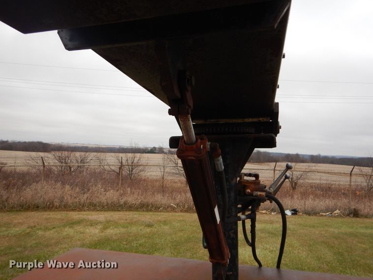 image for item DH5044 2003 GMC C7500 flat dump bed truck with conveyor