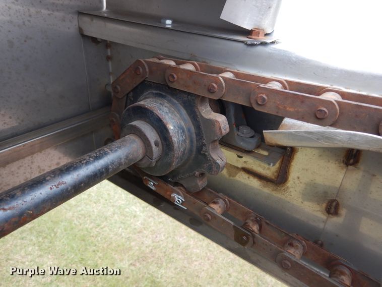 image for item DH5044 2003 GMC C7500 flat dump bed truck with conveyor