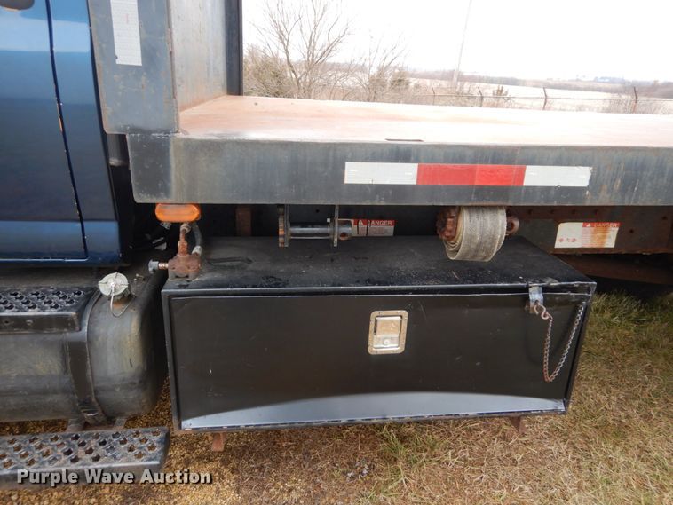 image for item DH5044 2003 GMC C7500 flat dump bed truck with conveyor