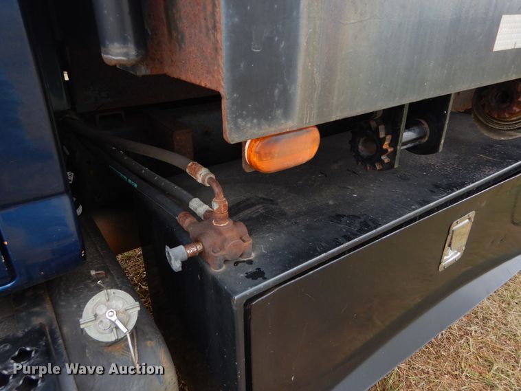 image for item DH5044 2003 GMC C7500 flat dump bed truck with conveyor