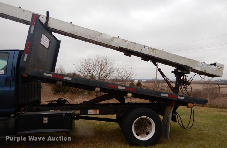 image for item DH5044 2003 GMC C7500 flat dump bed truck with conveyor