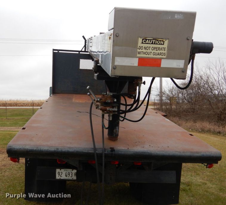 image for item DH5044 2003 GMC C7500 flat dump bed truck with conveyor