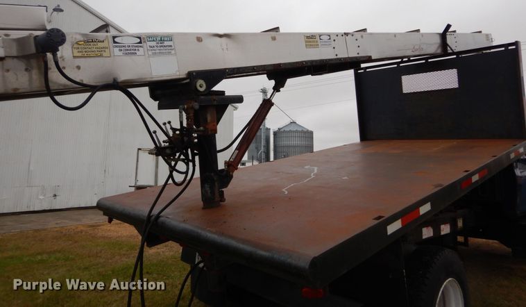 image for item DH5044 2003 GMC C7500 flat dump bed truck with conveyor