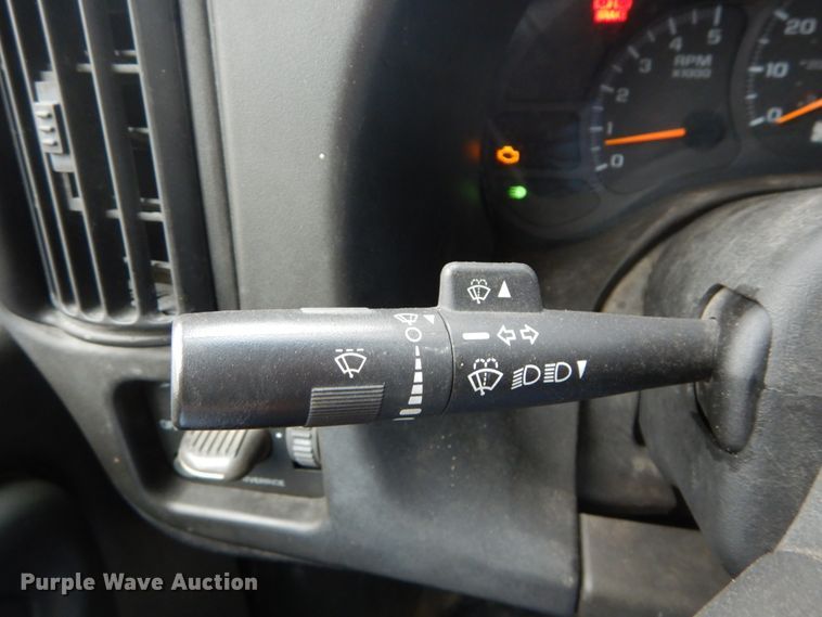 image for item DH5044 2003 GMC C7500 flat dump bed truck with conveyor