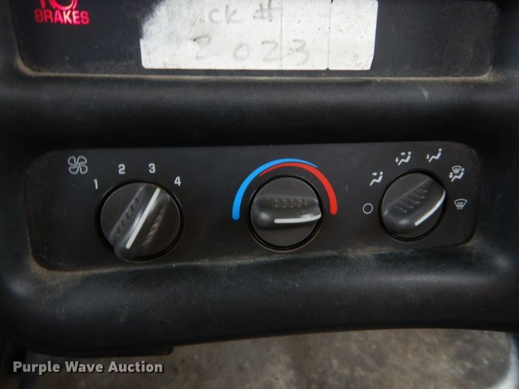 image for item DH5044 2003 GMC C7500 flat dump bed truck with conveyor