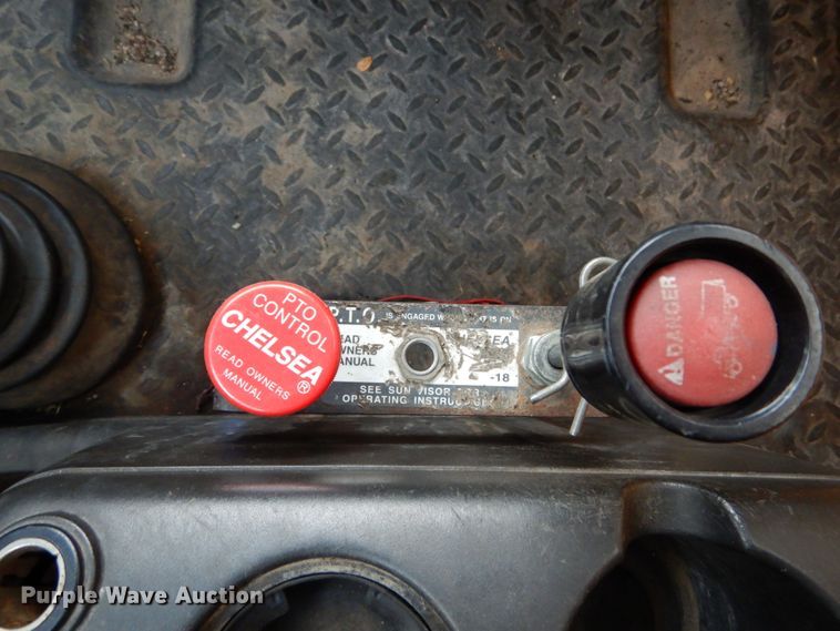 image for item DH5044 2003 GMC C7500 flat dump bed truck with conveyor