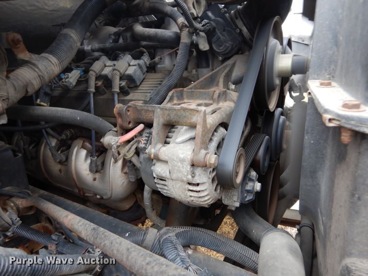 image for item DH5044 2003 GMC C7500 flat dump bed truck with conveyor