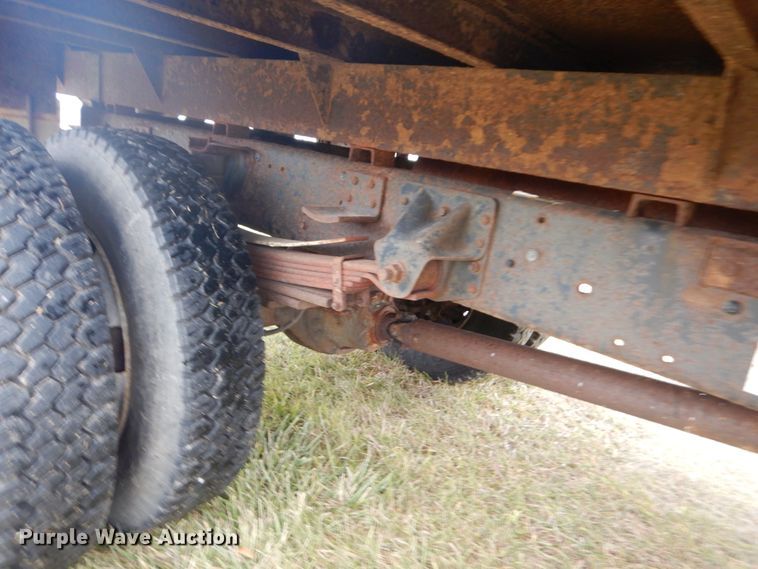 image for item DH5044 2003 GMC C7500 flat dump bed truck with conveyor