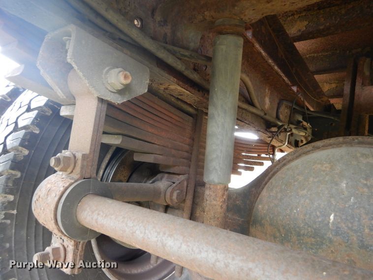 image for item DH5044 2003 GMC C7500 flat dump bed truck with conveyor