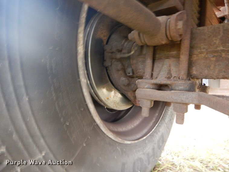 image for item DH5044 2003 GMC C7500 flat dump bed truck with conveyor