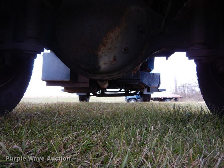 image for item DH5044 2003 GMC C7500 flat dump bed truck with conveyor