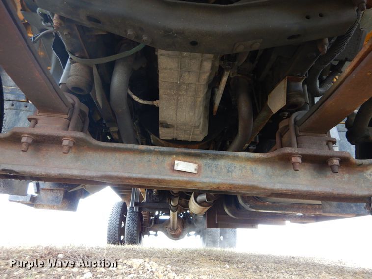 image for item DH5044 2003 GMC C7500 flat dump bed truck with conveyor