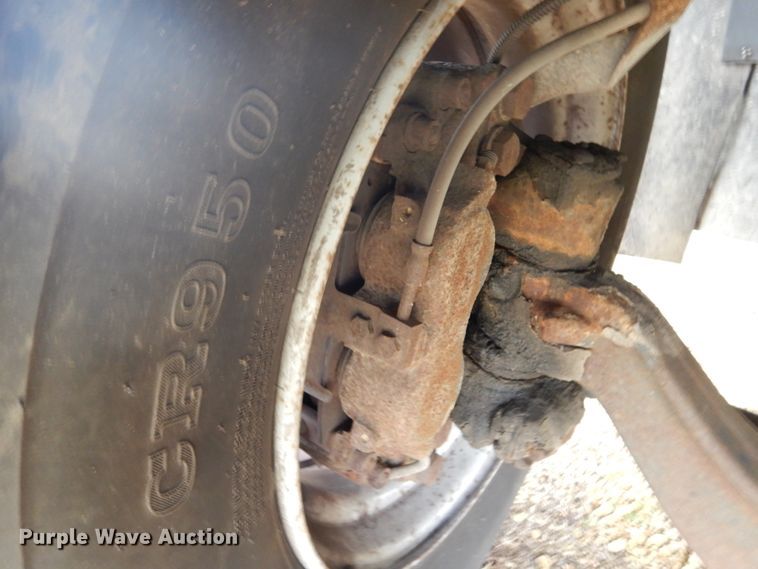 image for item DH5044 2003 GMC C7500 flat dump bed truck with conveyor