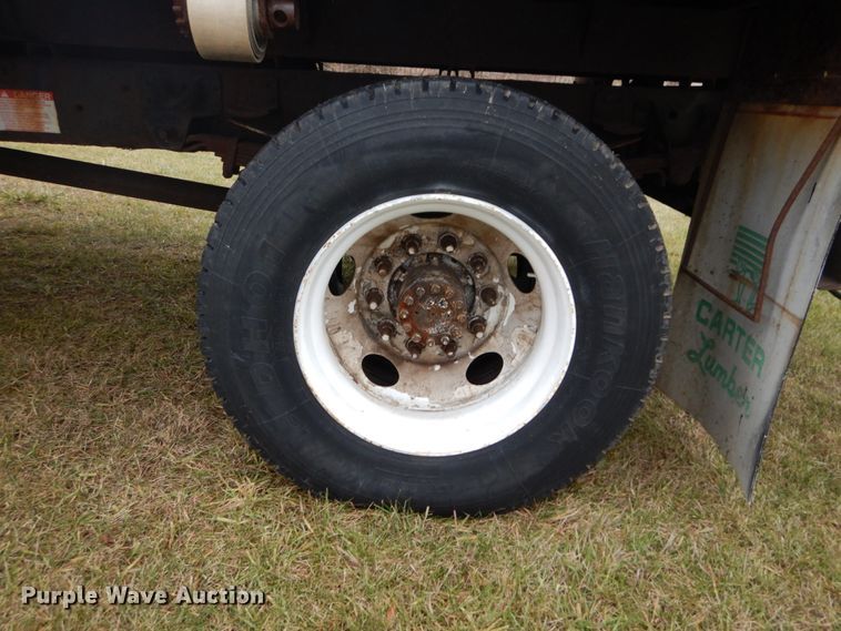 image for item DH5044 2003 GMC C7500 flat dump bed truck with conveyor