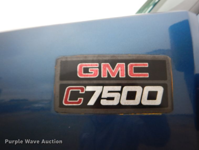 image for item DH5044 2003 GMC C7500 flat dump bed truck with conveyor