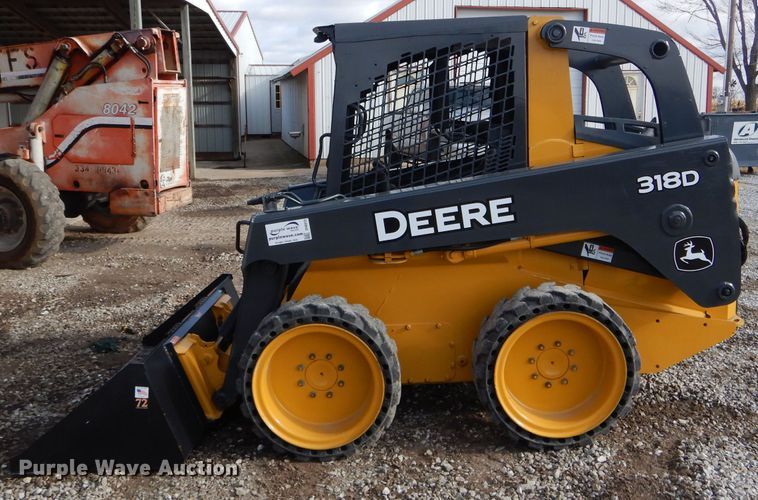 image for item DH6915 2013 John Deere 318D skid steer