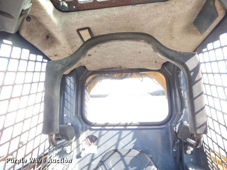 image for item DH6916 2010 John Deere 332D skid steer