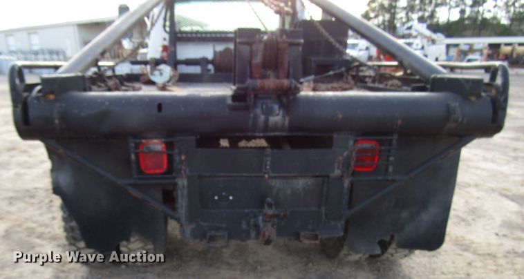 image for item DH8280 1998 Ford F700 winch truck