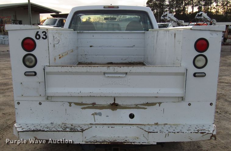 image for item DH8283 2009 Ford F250 Super Duty utility bed pickup truck