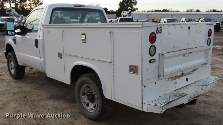 image for item DH8283 2009 Ford F250 Super Duty utility bed pickup truck