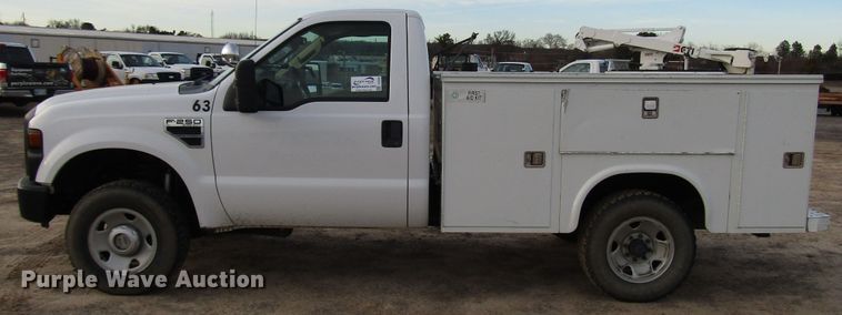 image for item DH8283 2009 Ford F250 Super Duty utility bed pickup truck