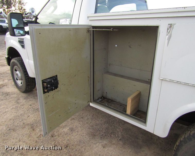 image for item DH8283 2009 Ford F250 Super Duty utility bed pickup truck