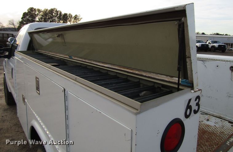 image for item DH8283 2009 Ford F250 Super Duty utility bed pickup truck