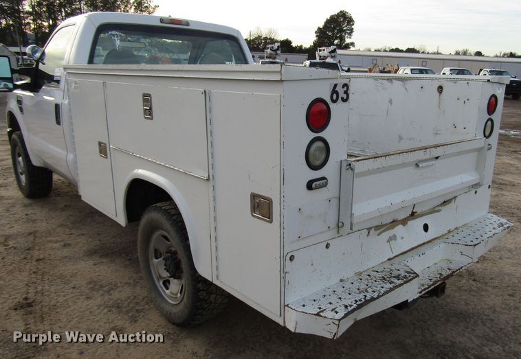 image for item DH8283 2009 Ford F250 Super Duty utility bed pickup truck