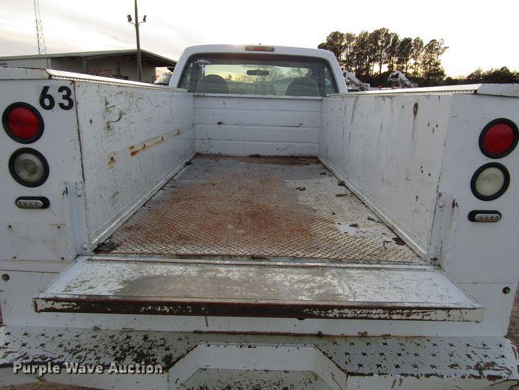 image for item DH8283 2009 Ford F250 Super Duty utility bed pickup truck