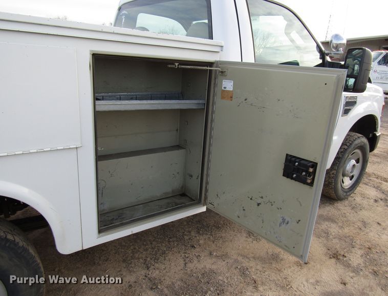 image for item DH8283 2009 Ford F250 Super Duty utility bed pickup truck