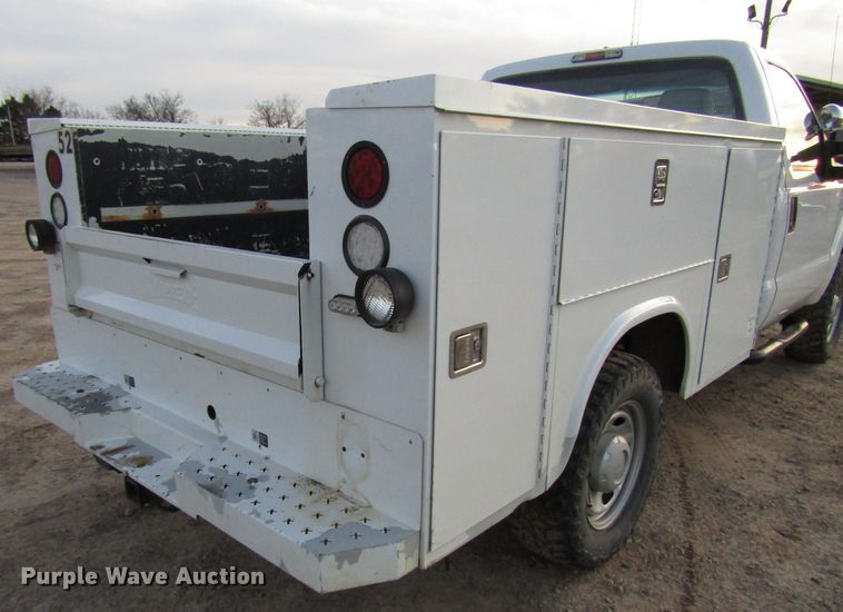 image for item DH8284 2013 Ford F250 Super Duty utility bed pickup truck