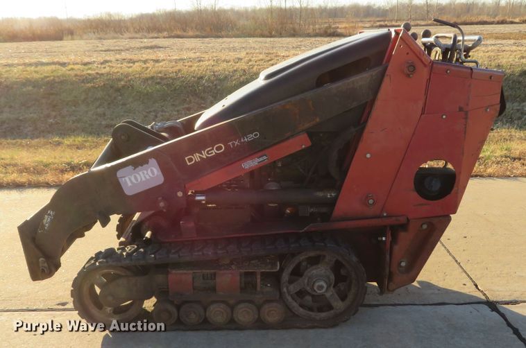 image for item DI2002 2005 Toro TX420 compact utility loader