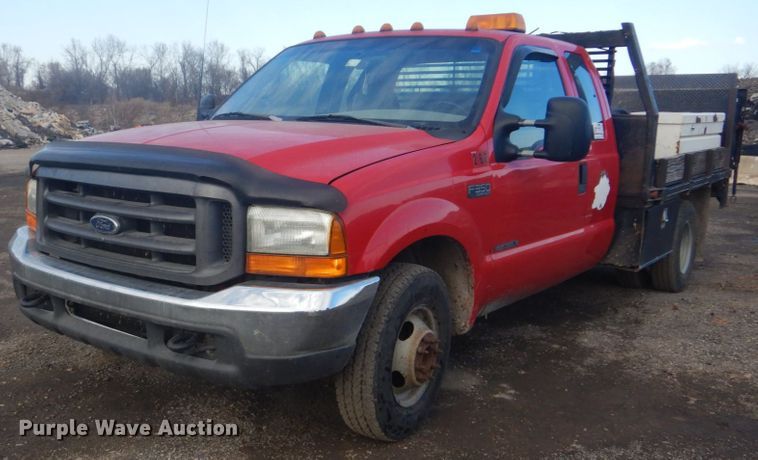 image for item DI2391 2000 Ford F350 Super Duty SuperCab flatbed pickup truck