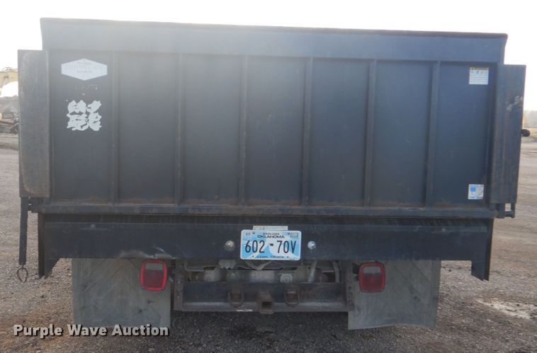 image for item DI2391 2000 Ford F350 Super Duty SuperCab flatbed pickup truck