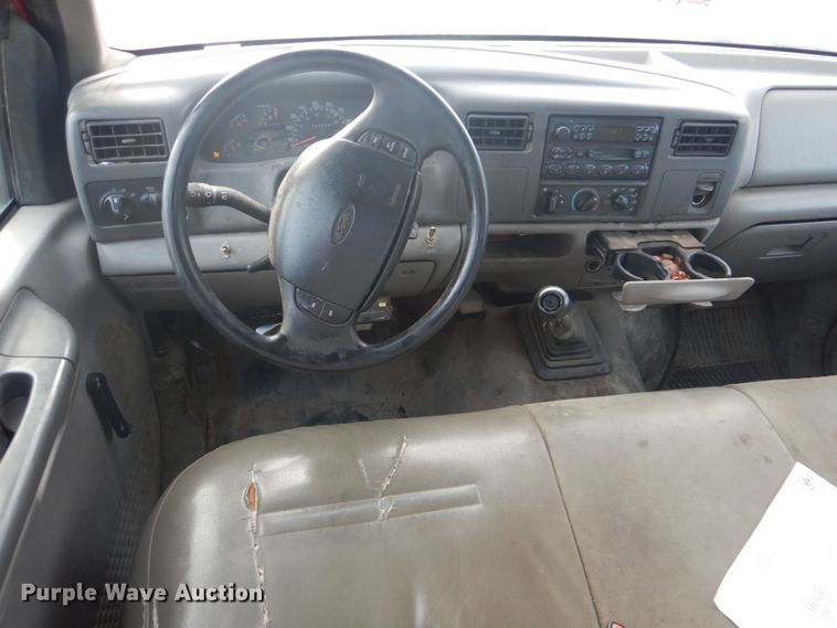 image for item DI2391 2000 Ford F350 Super Duty SuperCab flatbed pickup truck