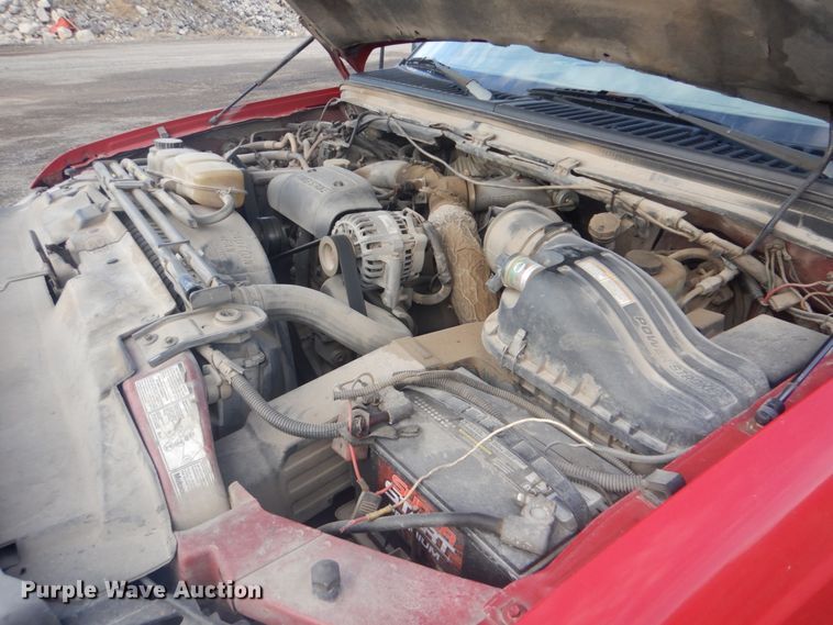 image for item DI2391 2000 Ford F350 Super Duty SuperCab flatbed pickup truck