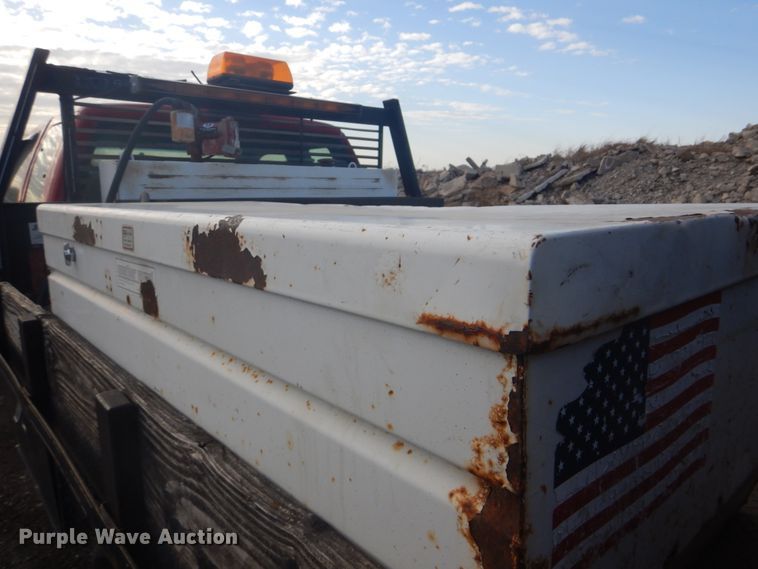 image for item DI2391 2000 Ford F350 Super Duty SuperCab flatbed pickup truck