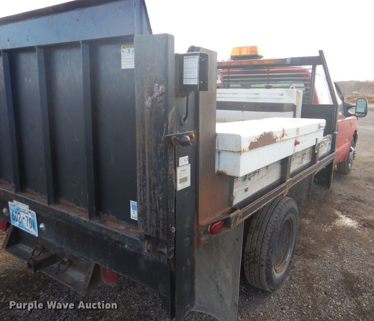 image for item DI2391 2000 Ford F350 Super Duty SuperCab flatbed pickup truck