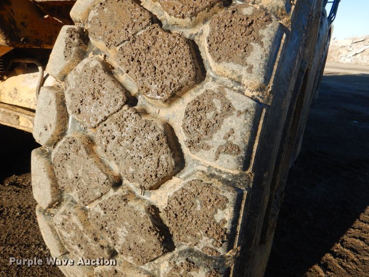 image for item DI2392 2003 Caterpillar 730 haul truck