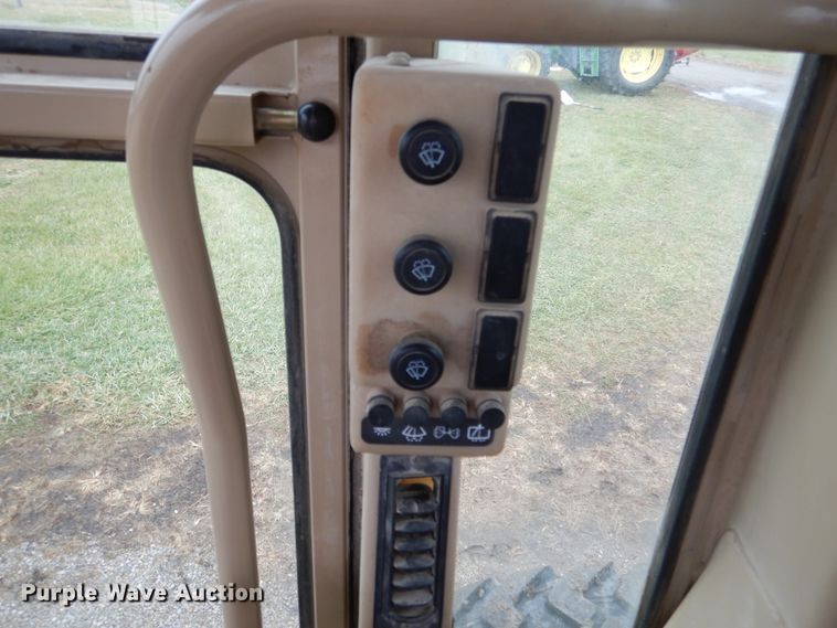 image for item EK9116 1998 Caterpillar 120H motor grader