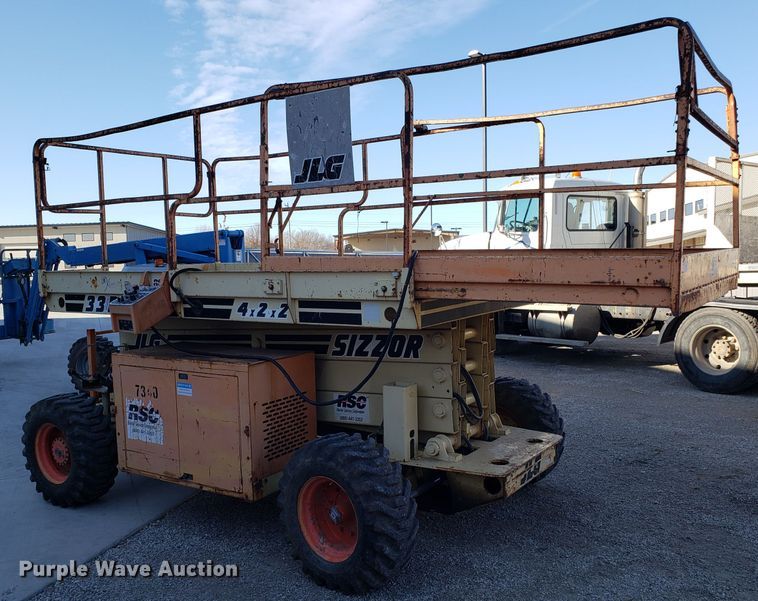 image for item GA9299 1996 JLG 33RTS scissor lift