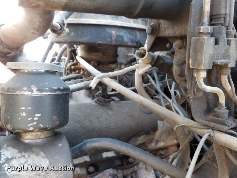 image for item GJ9173 1986 GMC 7000 chipper truck