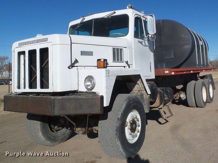 image for item DG0412 1980 International Paystar 5000 flatbed truck