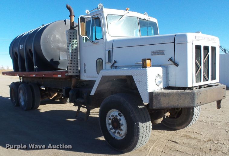 image for item DG0412 1980 International Paystar 5000 flatbed truck