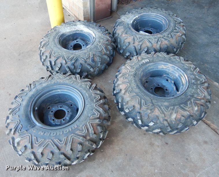 image for item GF9991 (4) 27x9.00R12 foam-filled tires and wheels