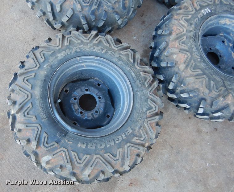 image for item GF9991 (4) 27x9.00R12 foam-filled tires and wheels