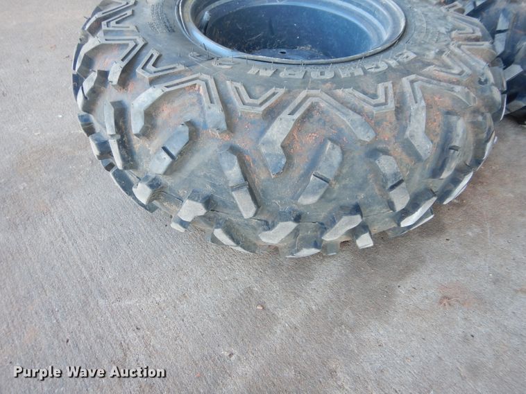 image for item GF9991 (4) 27x9.00R12 foam-filled tires and wheels